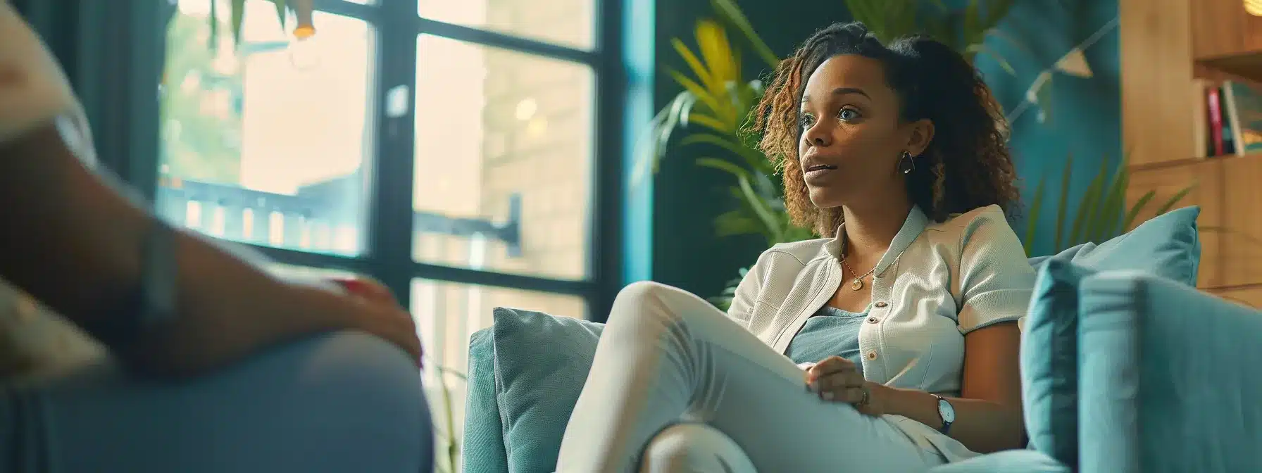 a woman sitting in a cozy office, surrounded by soothing colors and motivational quotes, discussing her career goals with a supportive counselor.