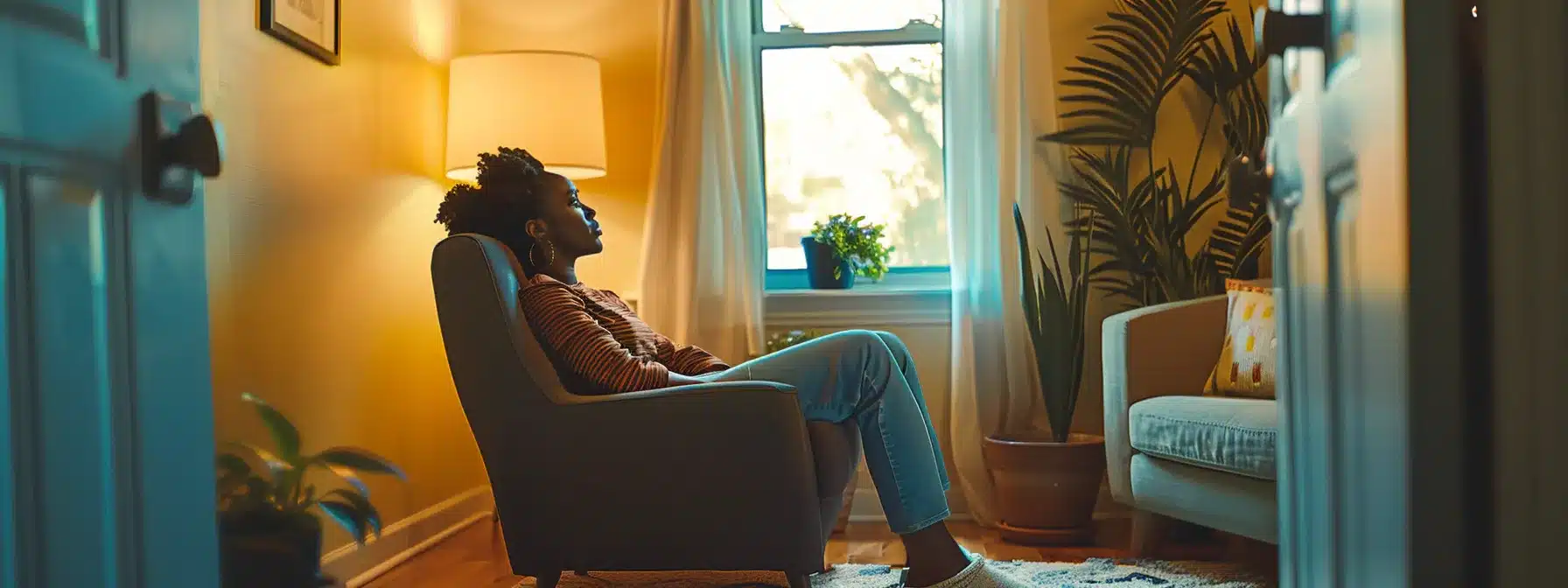 a person sitting in a cozy therapy office, surrounded by soothing colors and comforting furnishings, receiving compassionate support from a counselor.