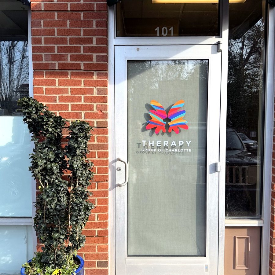 The front door of our South End office with the practice logo on the glass